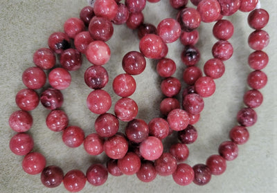 Thulite tumbled stone